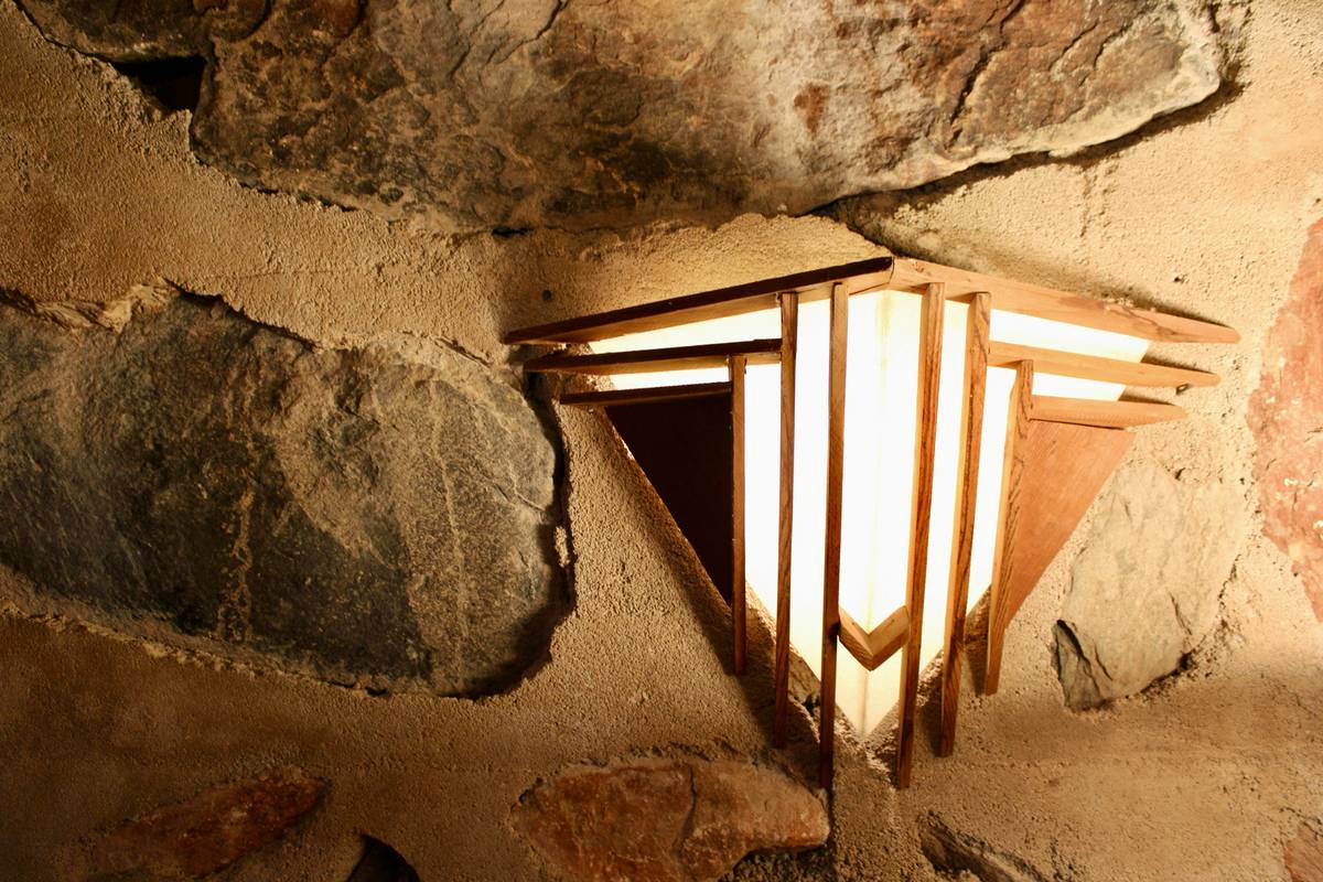 how to install wall sconce lighting with mounted fixture on beige wall